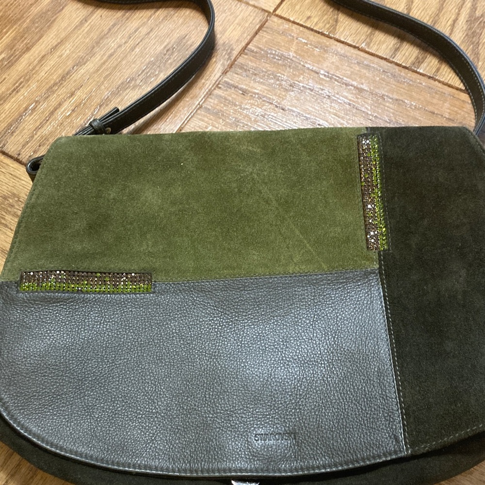 SWAROVSKI Women’s leather clutch purse